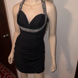 This is a black dress with multicolor bling